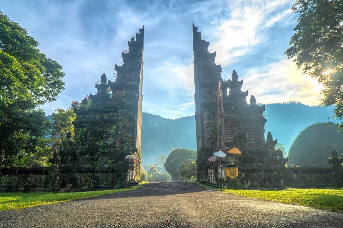 Handara Gate, the Balinese split gate at Bedugul, framing forested mountains in the Bali highlands