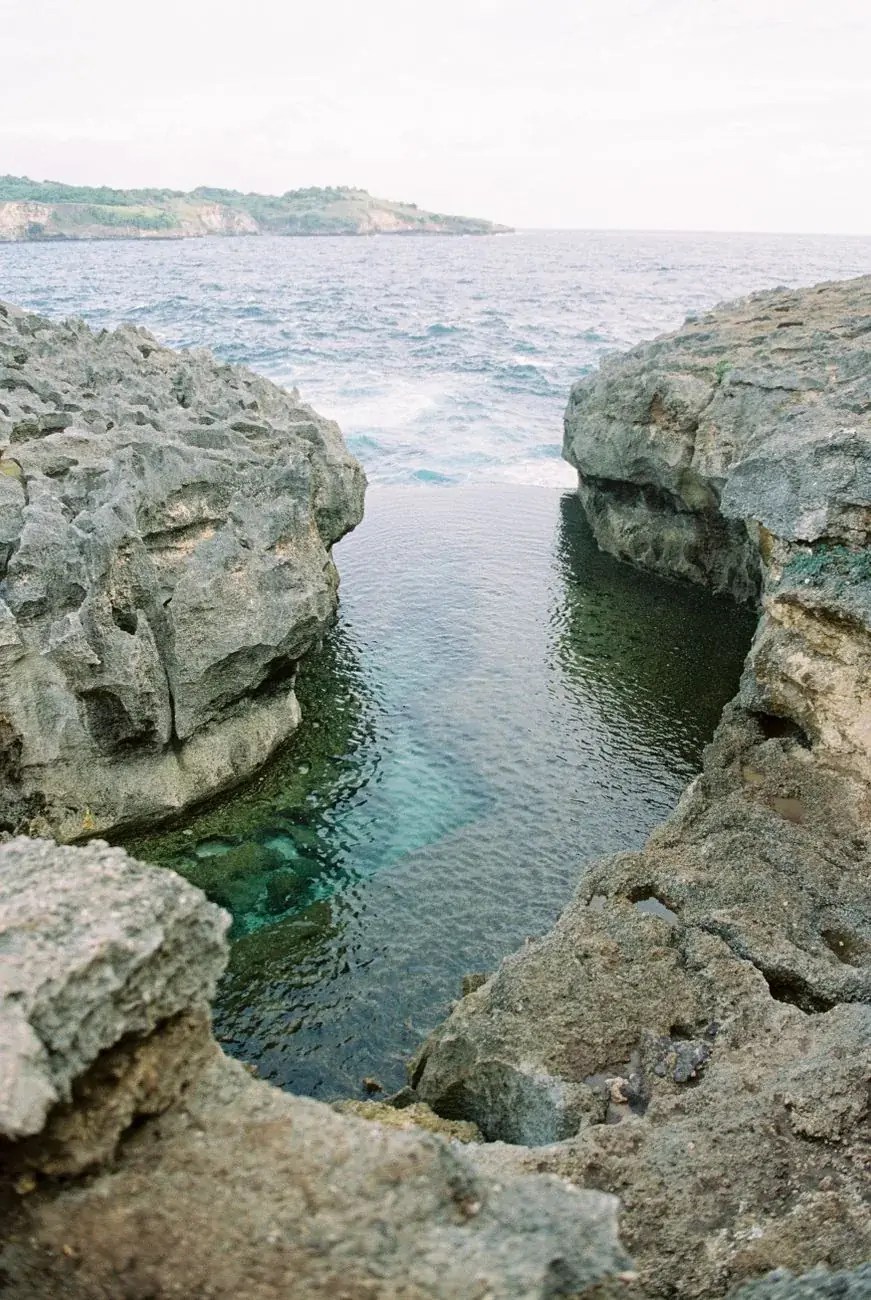 Angel's Billabong with the open sea breaking against the outer rock and running into the channel
