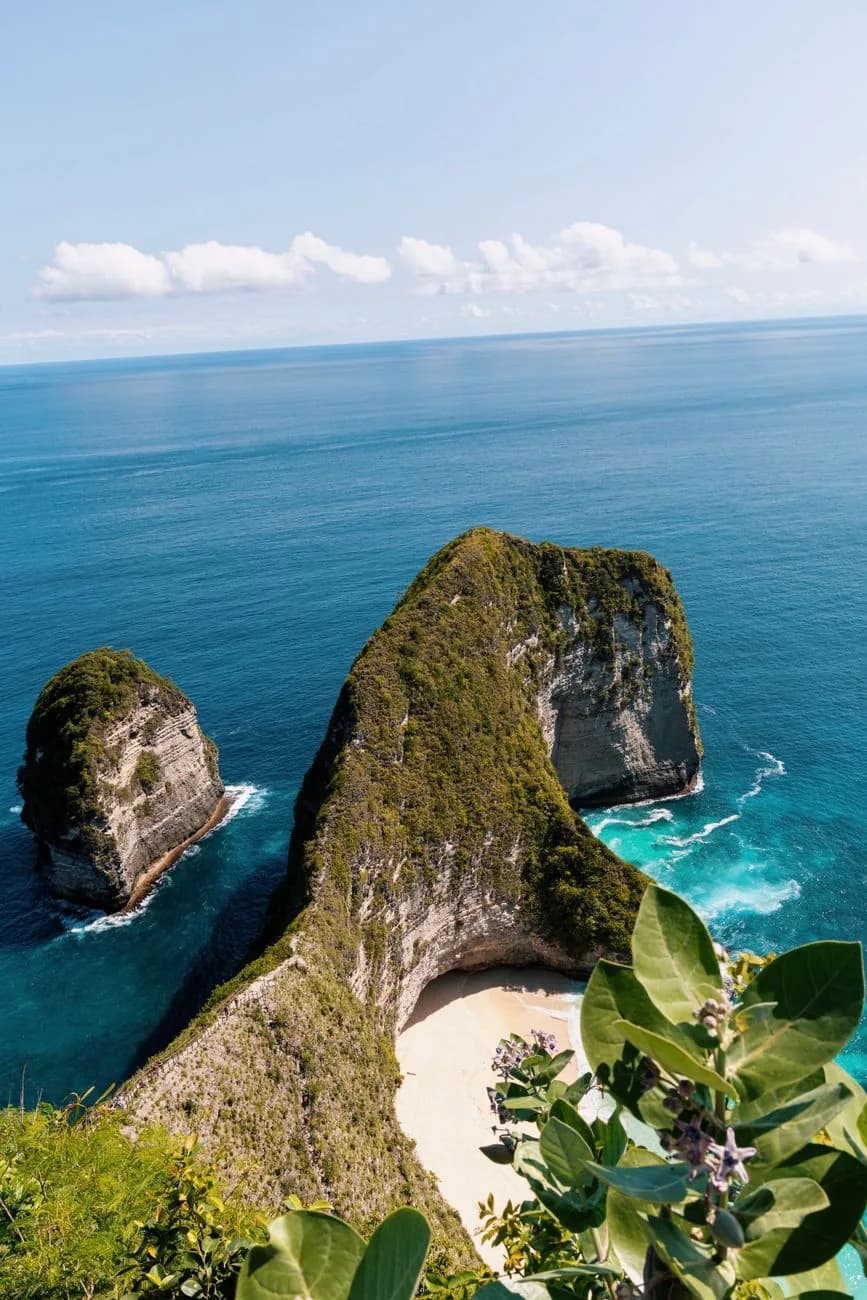 The Kelingking headland shaped like a sleeping dinosaur above its white sand bay, Nusa Penida