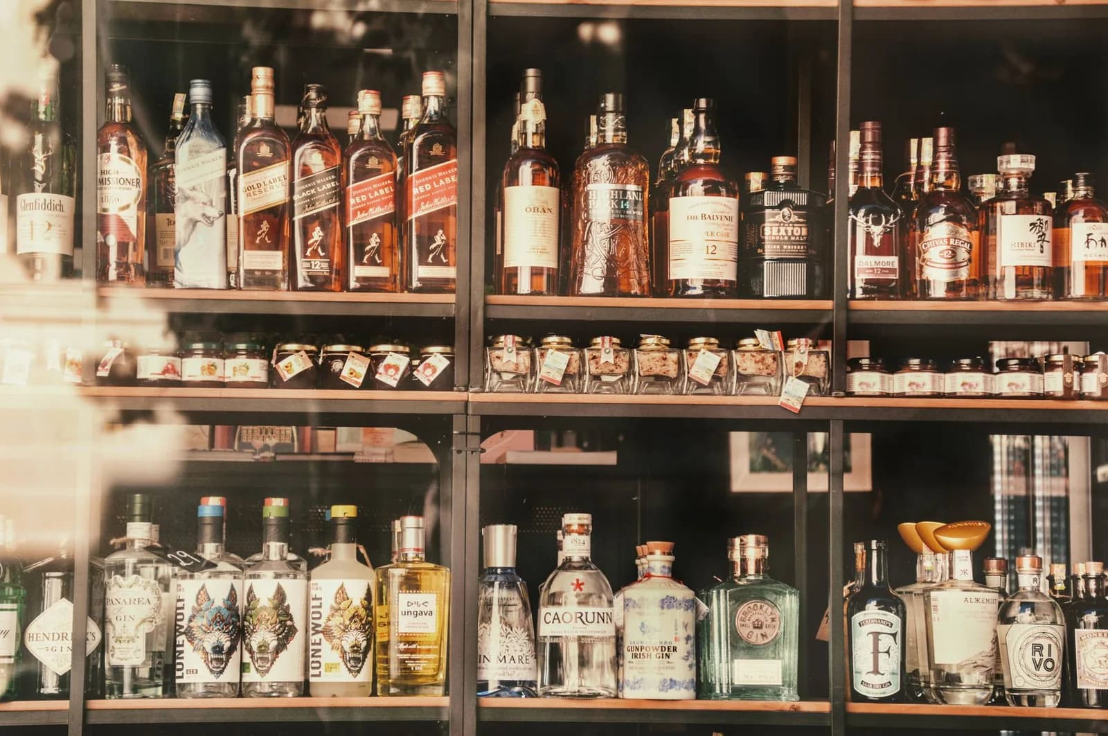 Shelves of whisky, gin and other spirit bottles