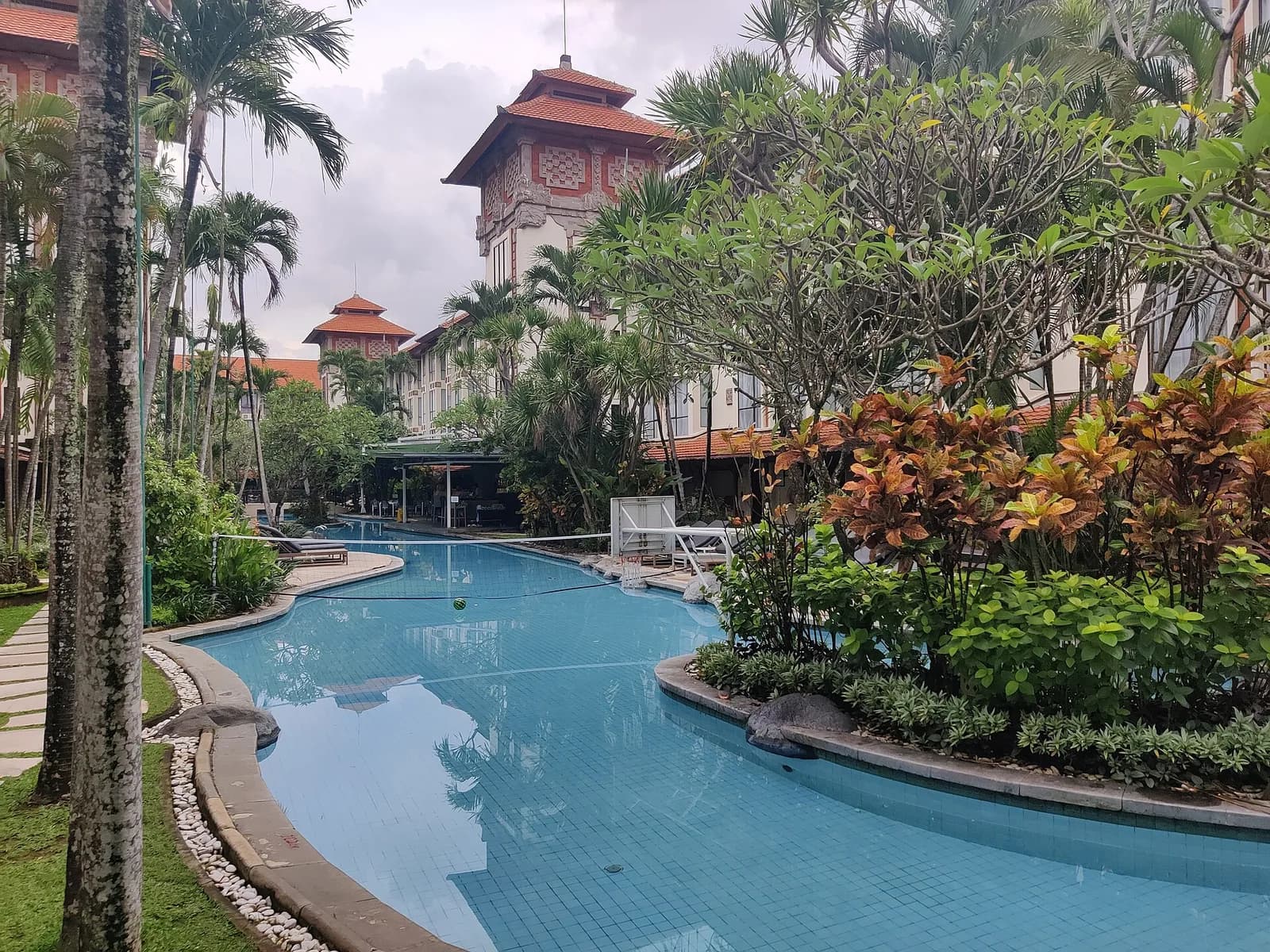 Lagoon-style swimming pool and tropical garden at the Prime Plaza Hotel, Sanur, Bali