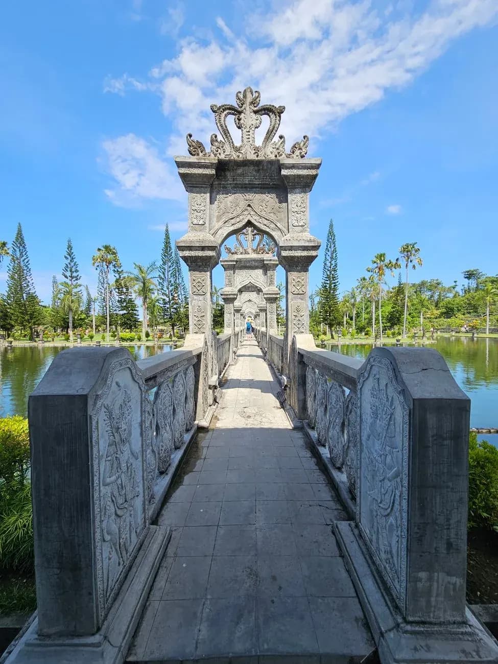 The long pillared bridge across the rectangular pond at Taman Ujung water palace, the site most often mislabelled as Tirta Gangga