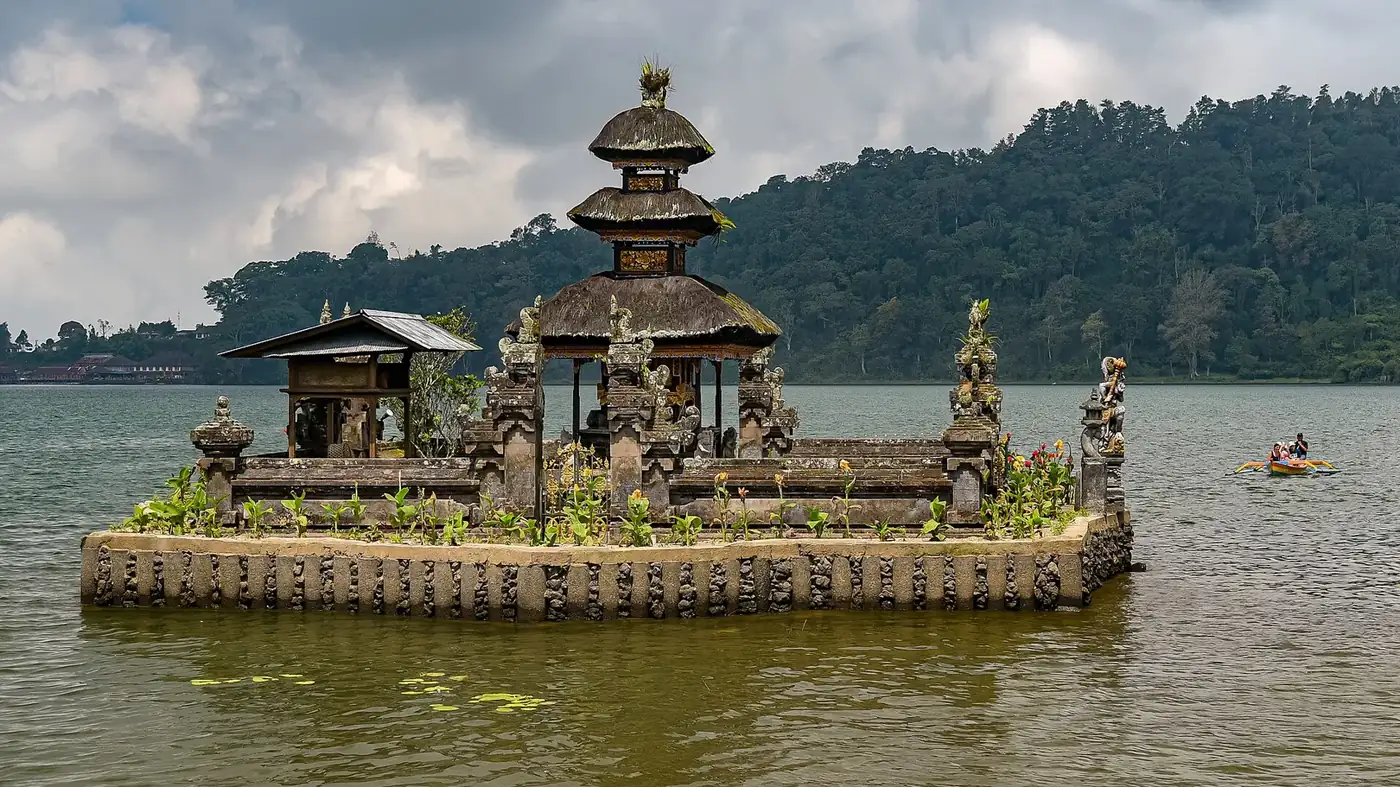The three-tiered meru of Ulun Danu Beratan standing alone on its small island in high water