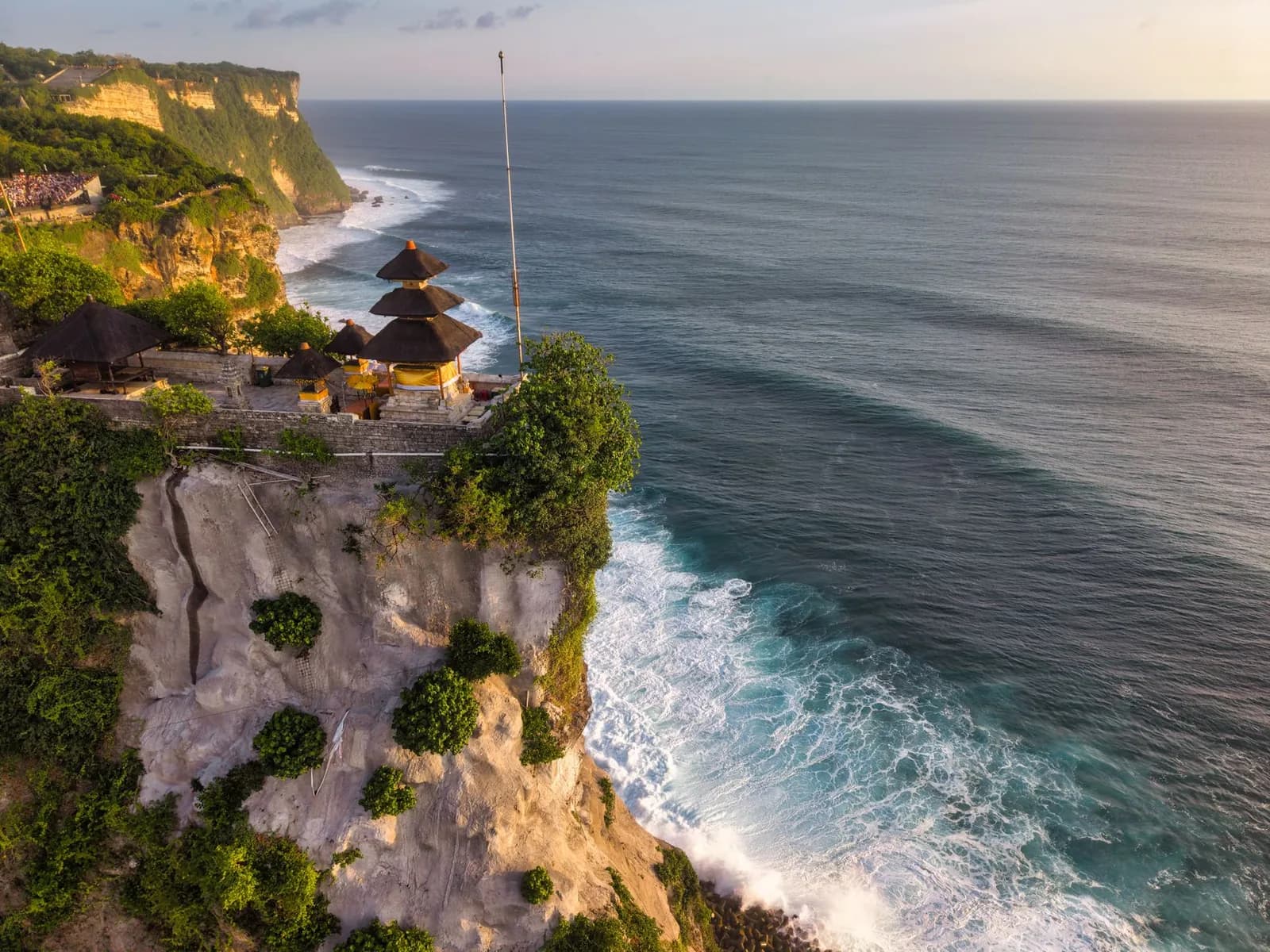 The shrine of Pura Luhur Uluwatu on the edge of its limestone cliff above the Indian Ocean, Bali